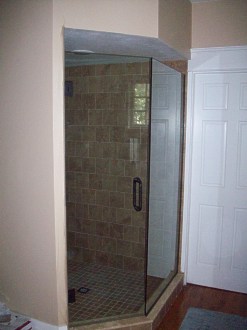 Shower door and enclosure